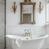 The Timeless Charm of French Elegance: Gold-Framed Mirror & Clawfoot Tub Centerpiece 4