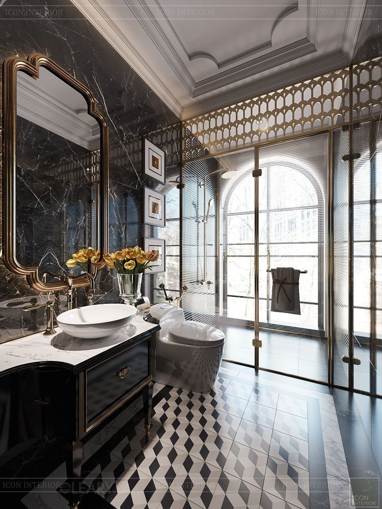 A luxurious Art Deco bathroom with black marble walls, a black vanity with gold details, an ornate gold mirror, and a shower screen with a gold artistic grille.