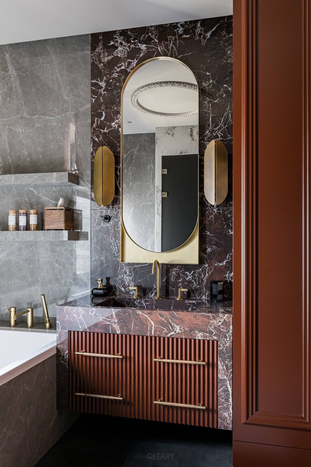 Material Mastery: Designing a Luxury Bathroom with Marble, Wood, and Brass