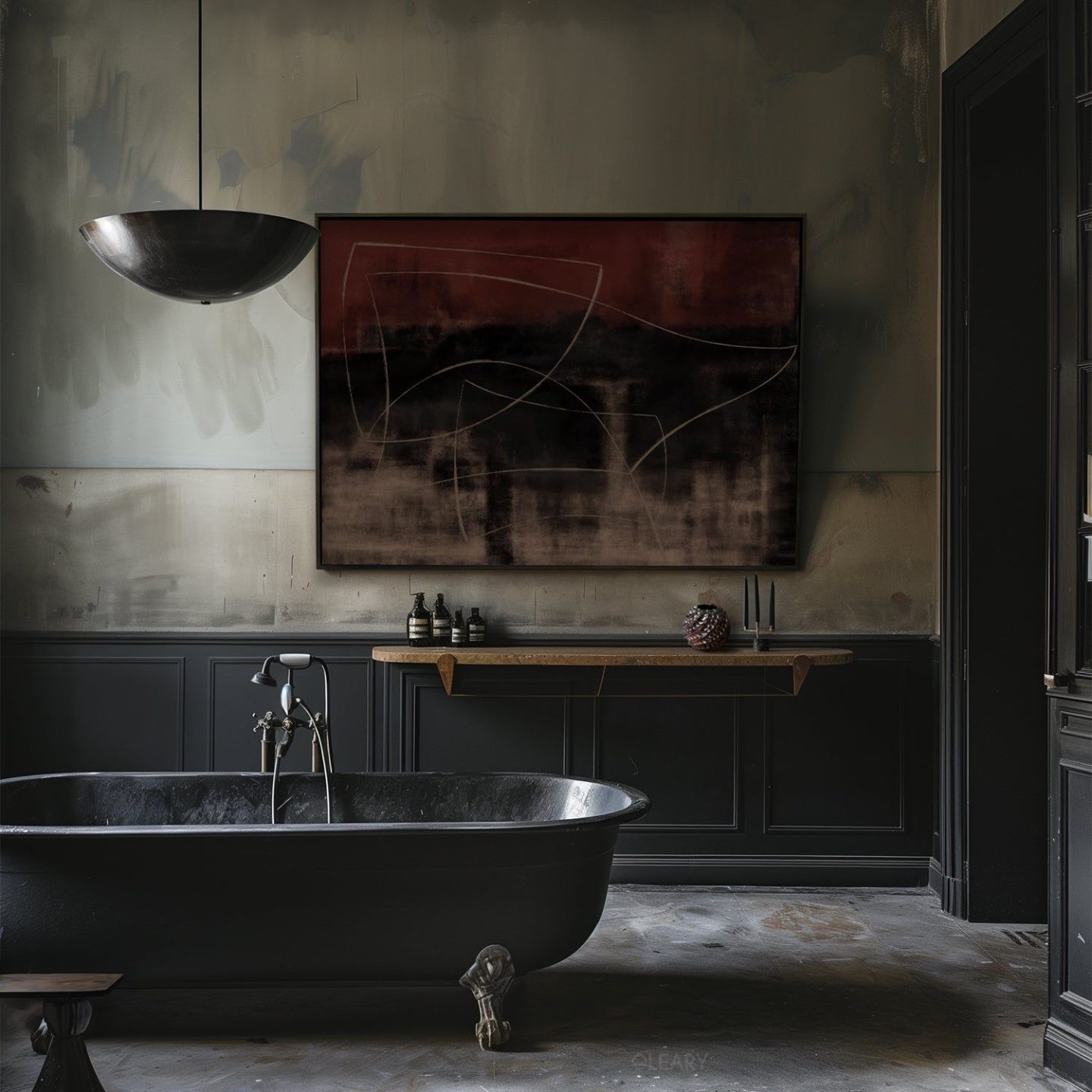A modern industrial bathroom featuring a matte black freestanding bathtub, minimalist concrete floor, abstract wall art, and bold dark tones.