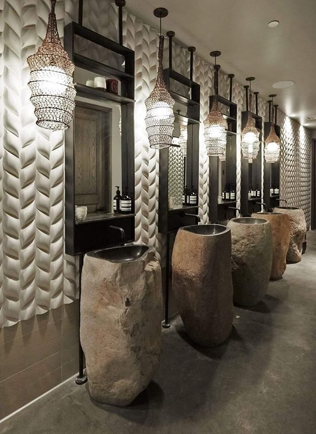 Raw Elegance: Sculpting Luxury Washrooms with Natural Stone Sinks & 3D Textured Walls