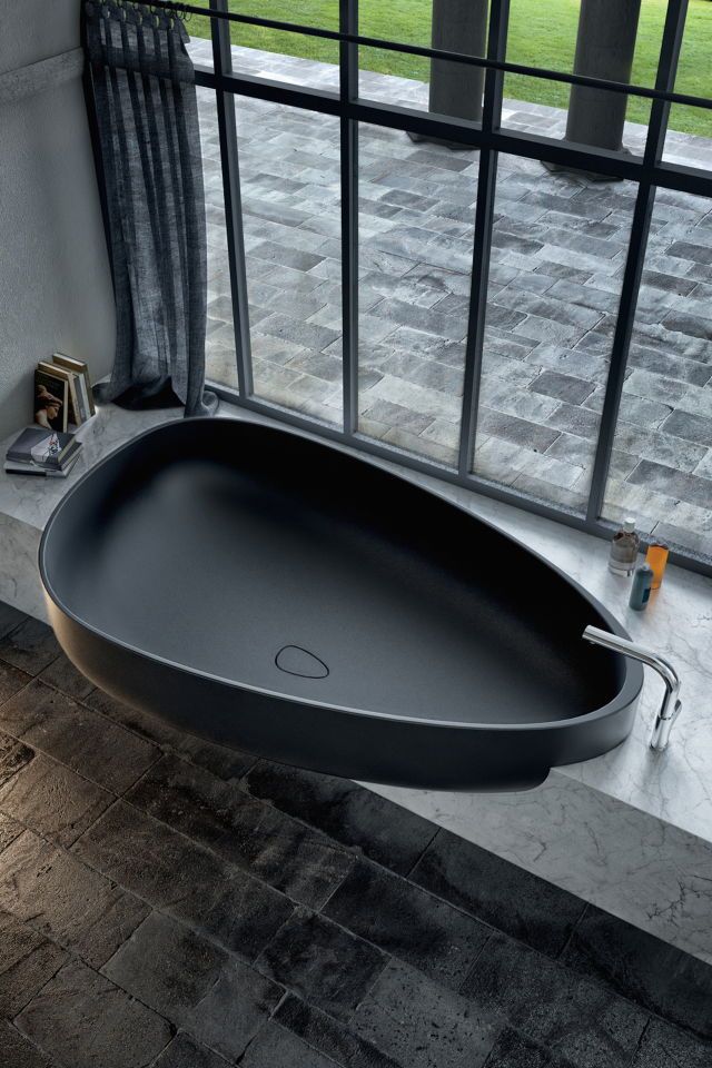 Architectural Artistry: Immerse Yourself in the Unique Luxury of a Matte Black Asymmetrical Freestanding Bathtub