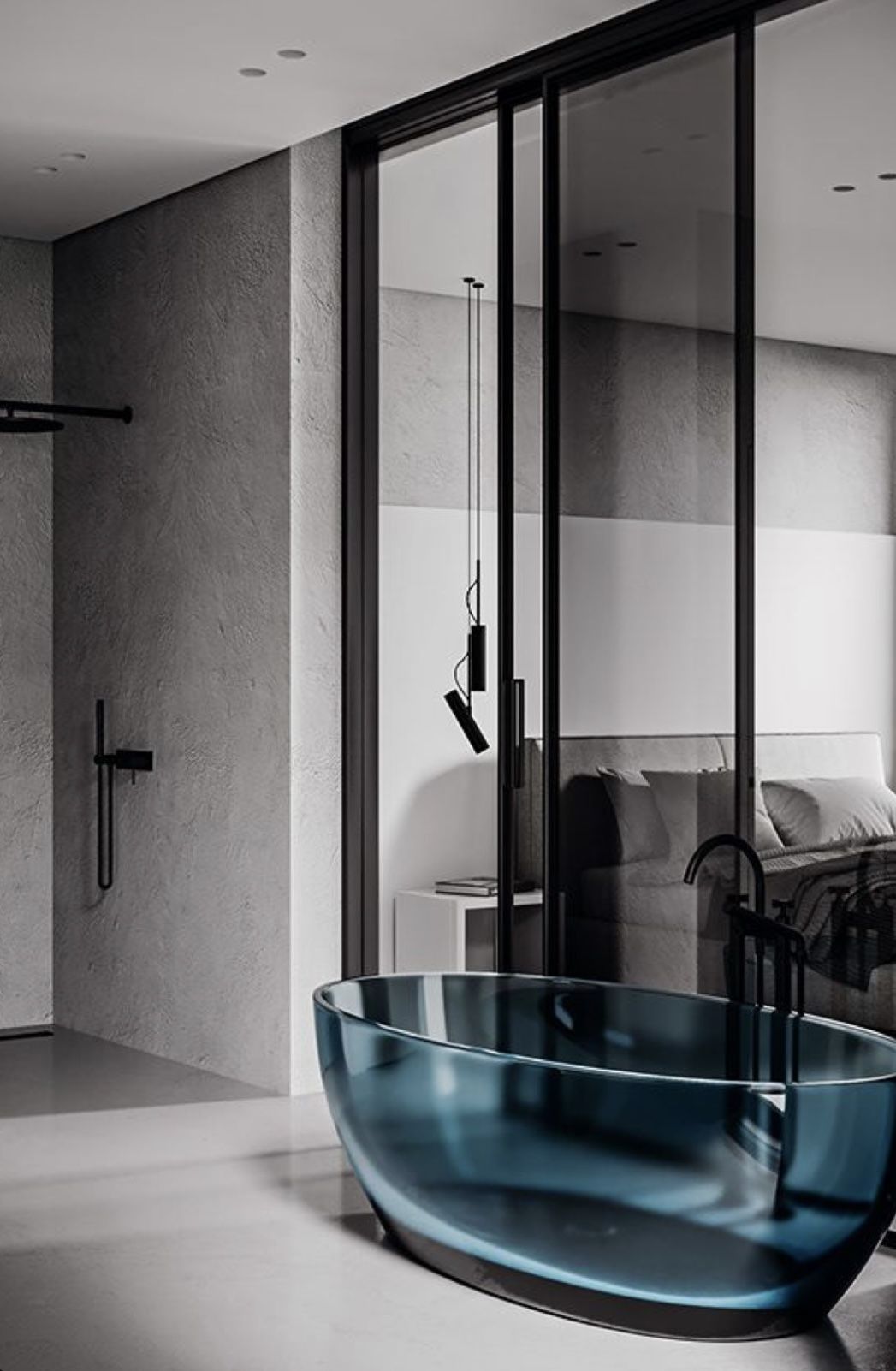 Deep blue transparent resin freestanding oval bathtub in a modern industrial-style bathroom, separated from the bedroom by glass doors.