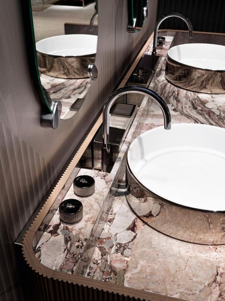 Refined Opulence: Designing Luxury Bathrooms with Rose Gold Sinks, Veined Marble & Fluted Wood Accents