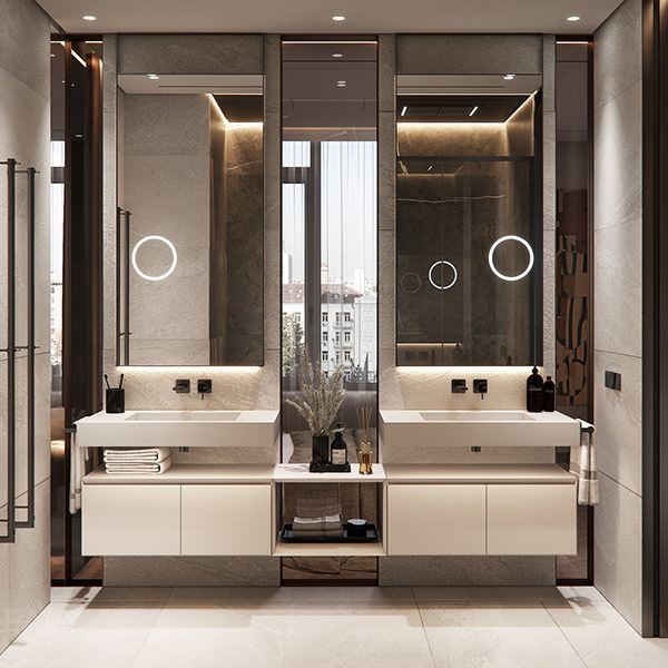 Luxurious modern bathroom featuring symmetrical white floating bathroom cabinets with integrated rectangular wall-hung style basins, complemented by dark wall-mounted faucets, tall mirrors with integrated vertical lighting, and a central dark wood open shelf unit.