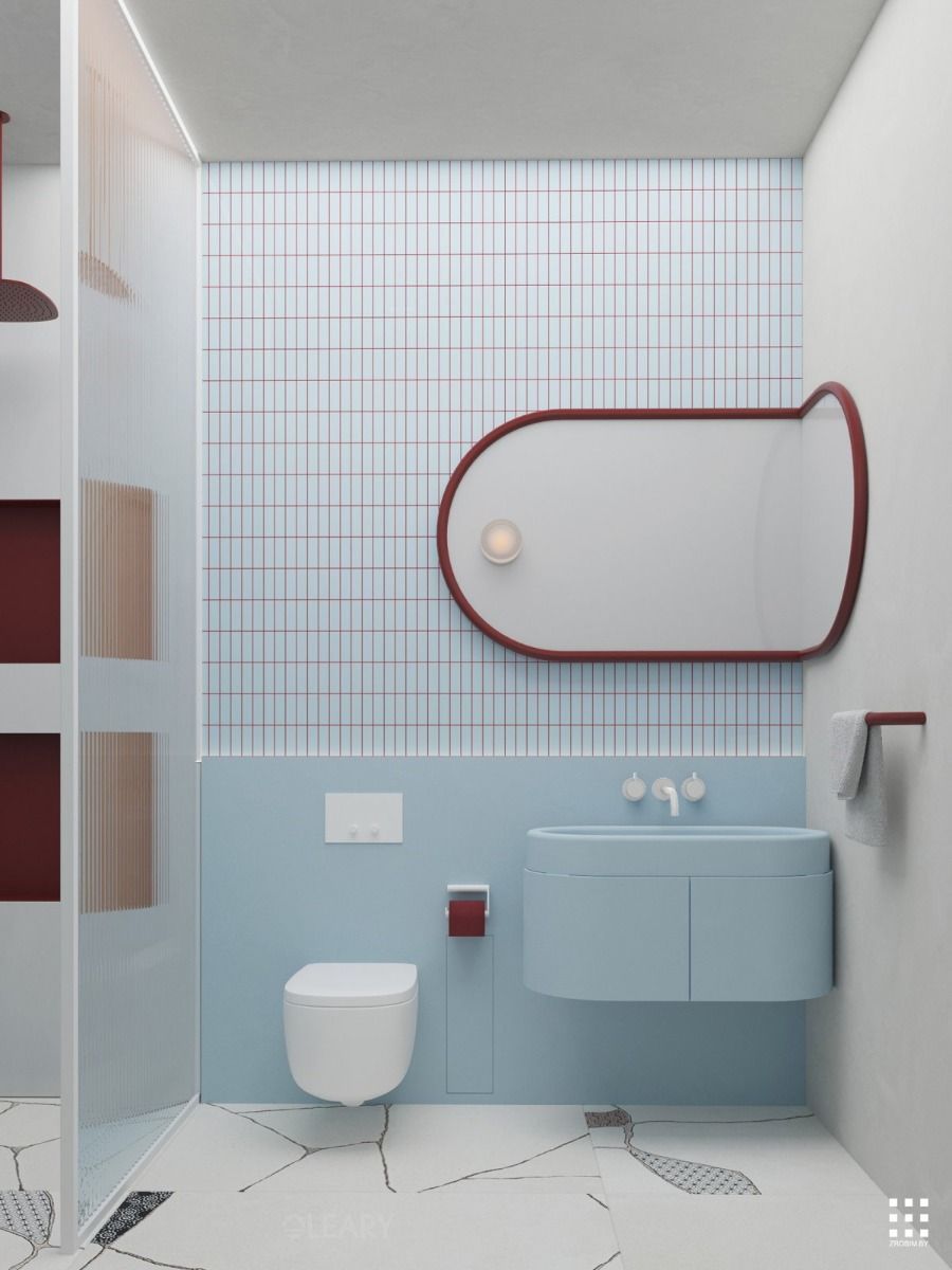 A playful and modern bathroom featuring the Play Collection powder blue wall-hung vanity with an integrated sink, set against a wall with blue paneling and white grid tiles, and accented with a custom burgundy-framed mirror.
