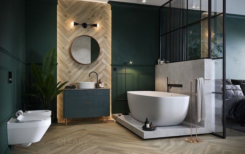 A luxurious dark green bathroom featuring a blue fluted vanity with a white vessel sink, a herringbone wood accent wall, and a modern white freestanding soaking tub.