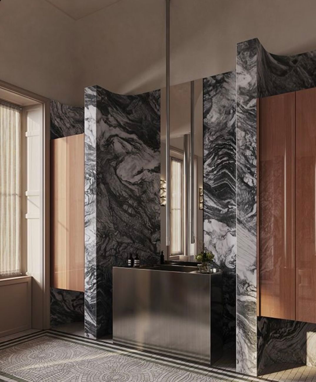 A luxury architectural bathroom featuring a freestanding stainless steel double vanity sink, framed by dramatic black and white marble pillars and warm wood cabinetry.