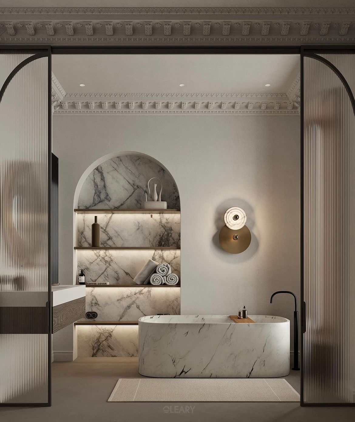Luxurious modern bathroom featuring a white marble freestanding oval bathtub, an arched marble niche with backlit shelves, and elegant arched fluted glass sliding doors, all under classical plaster moldings.