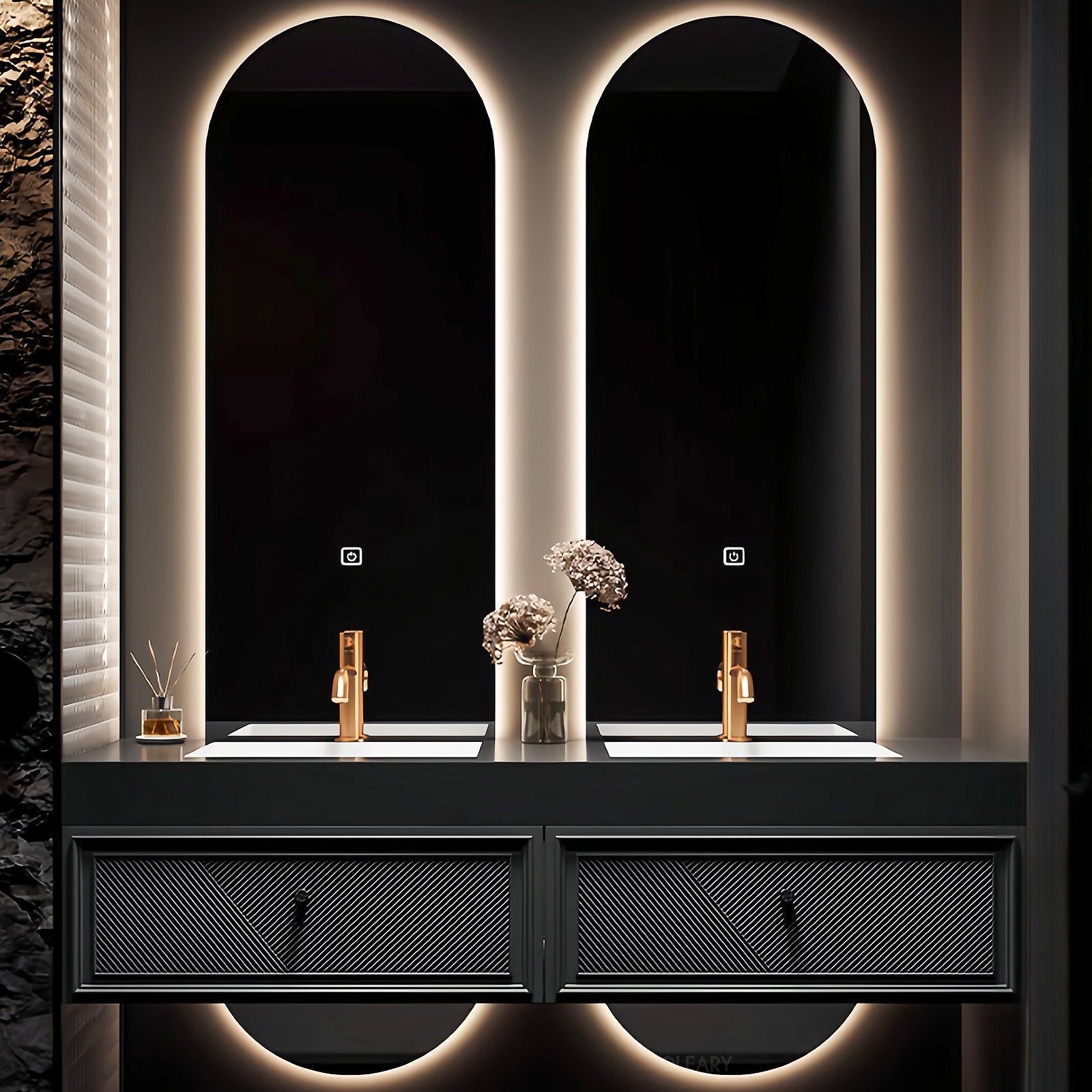 Luxury double bathroom vanity with black countertop, integrated white sinks, rose gold faucets, arched backlit mirrors, and textured black drawers.