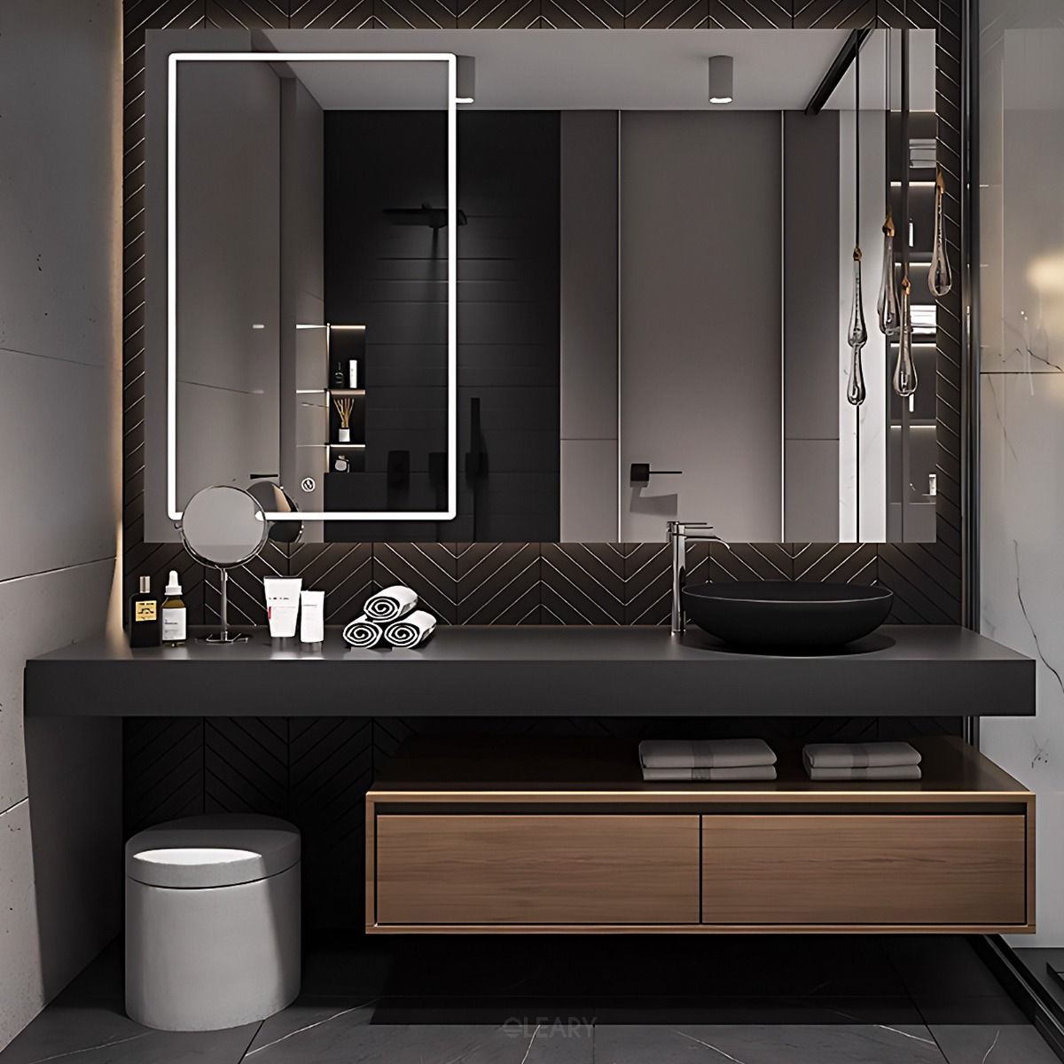 Modern floating bathroom vanity with black countertop, vessel sink, large backlit mirror, and wooden drawers, ideal for sleek, contemporary spaces.