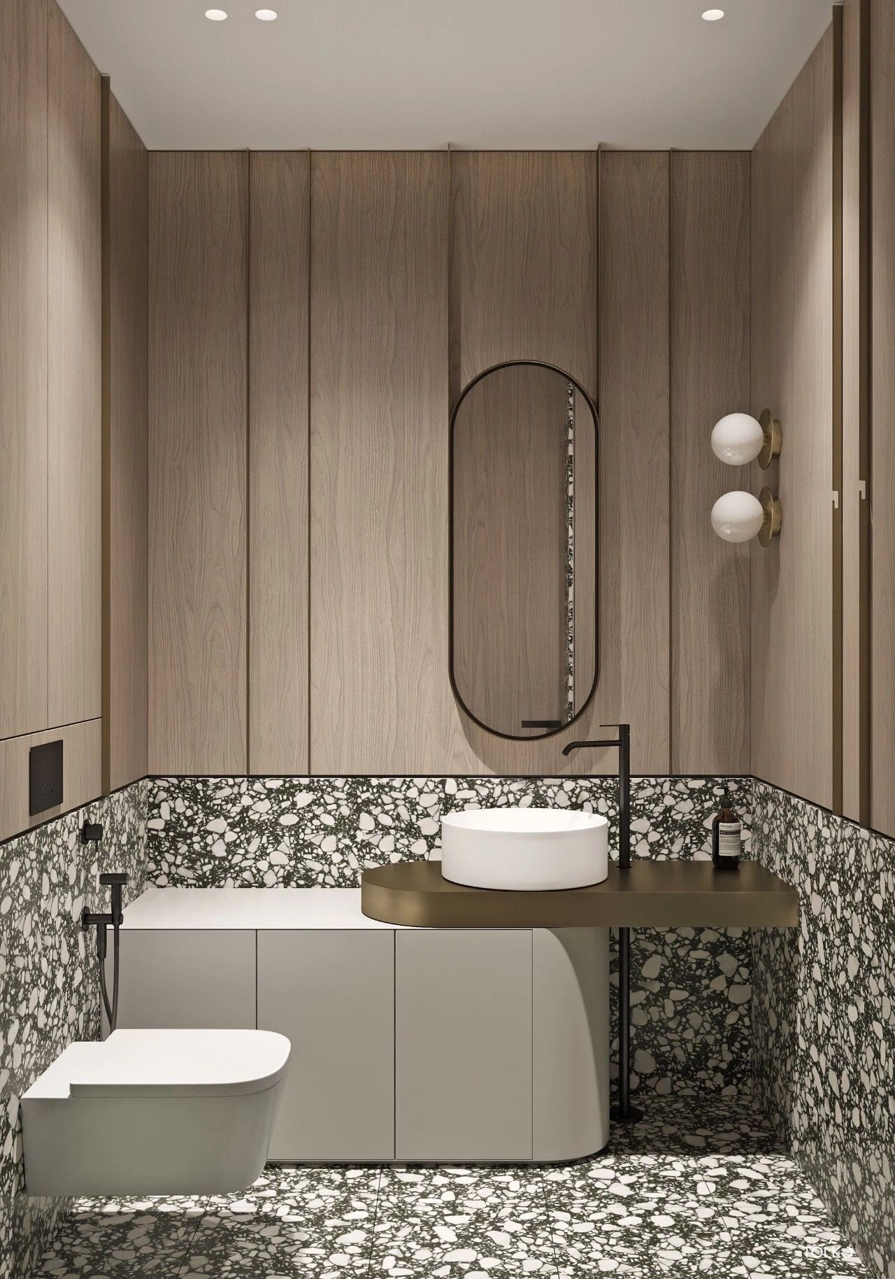 Modern bathroom featuring a floating vessel sink vanity with a white vessel sink and black wall-mounted faucet, dark countertop and custom cabinetry below, with wood finishes and terrazzo-patterned tiles in the background.